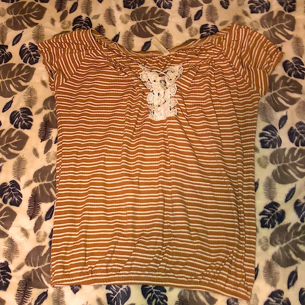 Cute shirt I just altered it because I lost the lace in the middle lol